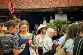 According to a research by the World Tourism Organisation, visa exemptions can help increase international tourist arrivals by 5-25%. (Photo: VietnamPlus)